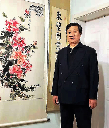 齐华庆照片.jpg