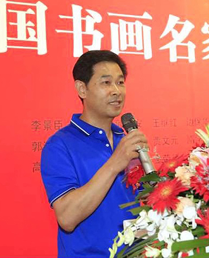 周明荣个人照片.jpg