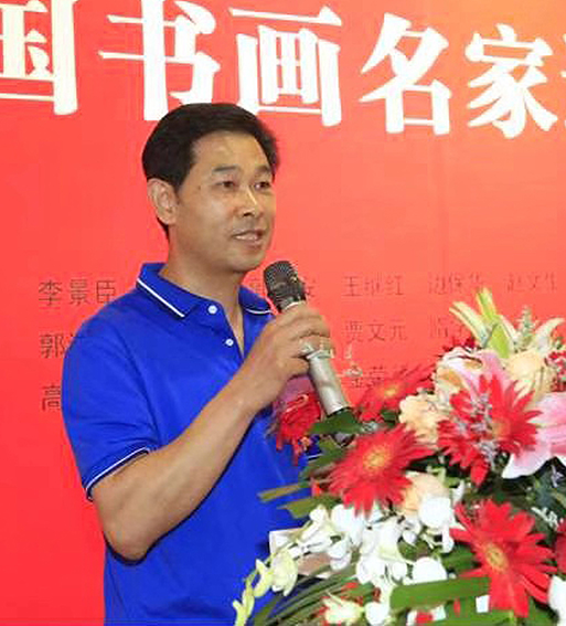 周明荣个人照片.jpg
