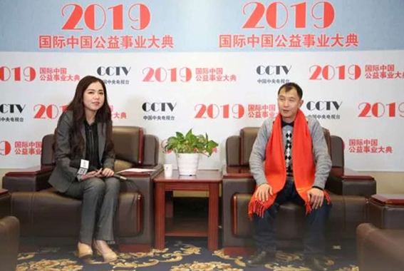 在北京受中央电台专访.png