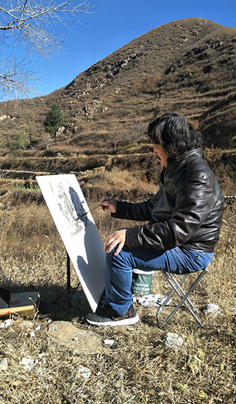 傅东明写生照1.jpg