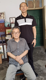与河南省政协常委、著名书法家许挺老师合影.png