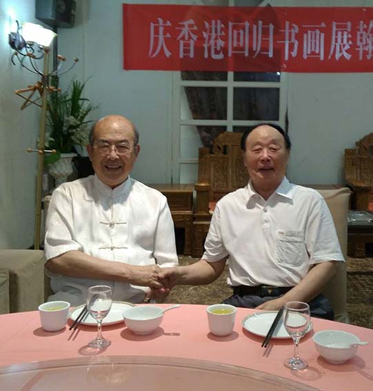 1.杜春富与权希军合影.jpg